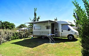 Motorhome on its campsite near the Palmyre