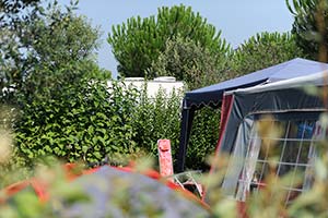 Caravan and tent pitch at the Parc de Bellevue campsite in Arvert near Oléron