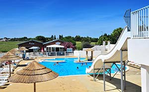 Water park at the Parc de Bellevue campsite with views of the park in Arvert