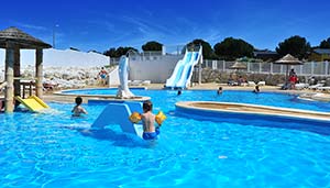 Children in the paddling pool at the Parc de Bellevue water park in Arvert