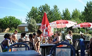 Terrace of the bar at the Parc de Bellevue campsite in Arvert near La Palmyre
