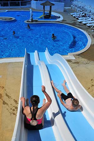 Water slides of the pool at Parc de Bellevue campsite in Charente-Maritime