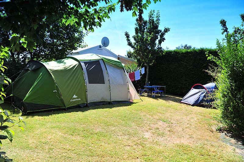 View of the wooded park with pitch for tent in Arvert