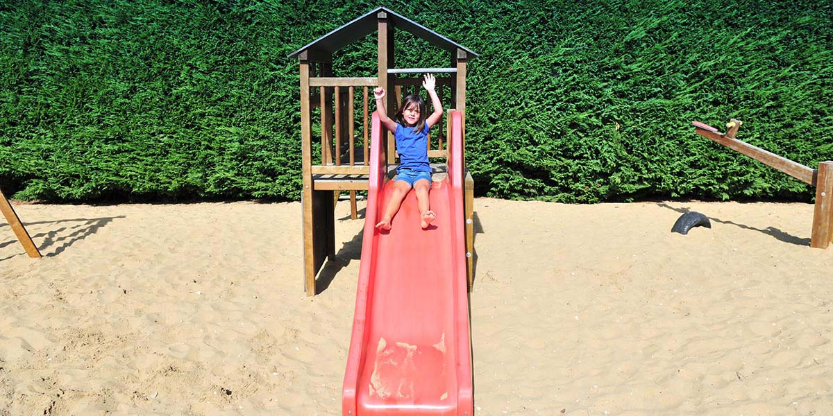 Slide on the playground of the campsite in Charente Maritime